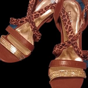 Bebe Leopard print platform sandals size 7  brown and gold